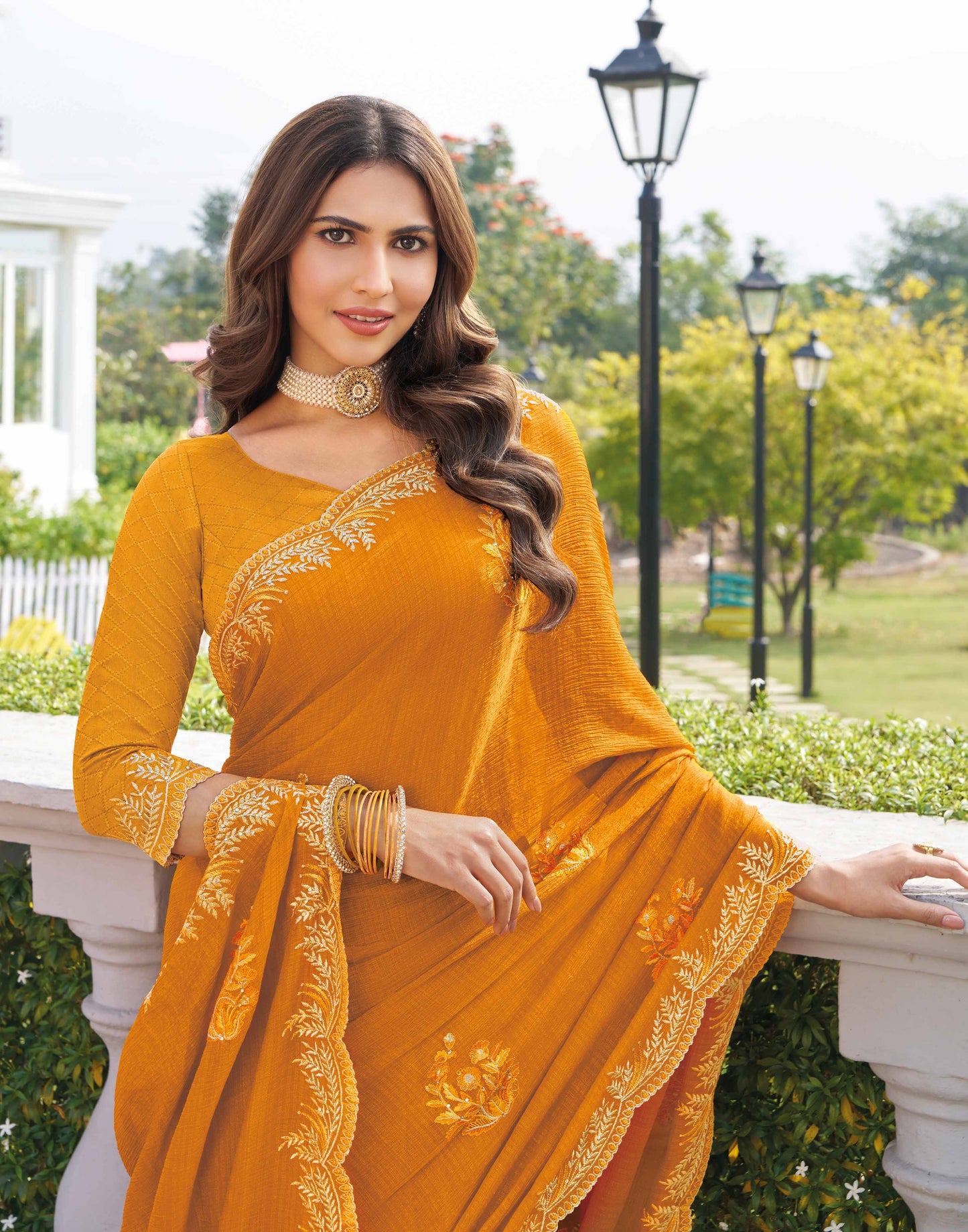 Laxmipati Makhan Malai Orange Chiffon Floral Embroidered Saree