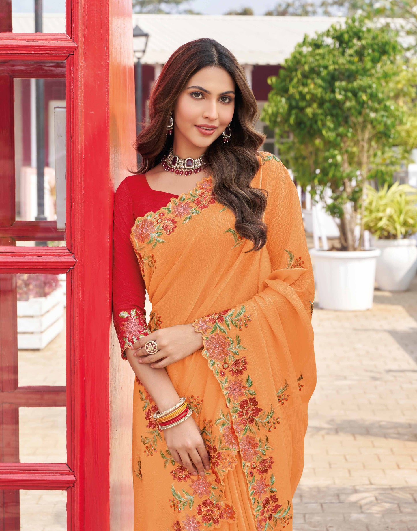 Laxmipati Makhan Malai Orange Chiffon Floral Embroidered Saree